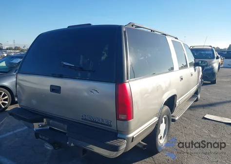 1999 Chevrolet Suburban 1500 Lt из США, поврежденный, VIN 3GNEC16R1XG252104